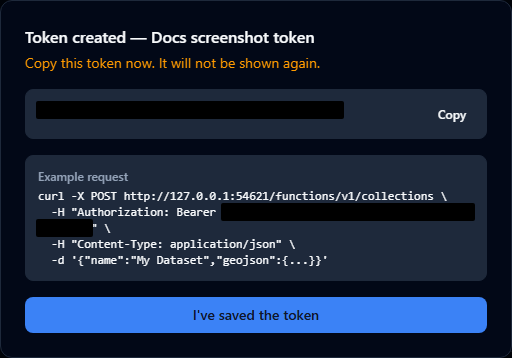 The token created dialog showing the one-time gp_ prefixed token value and an example curl request